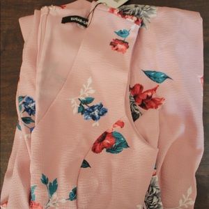 floral romper. BRAND NEW